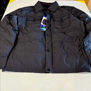Ultra light down jacket size large. New with tags.